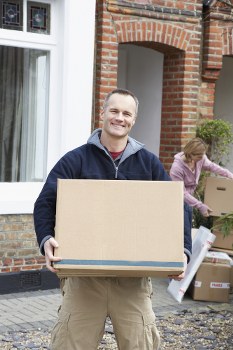 Moving team handling flat removals in a Haringey residential street
