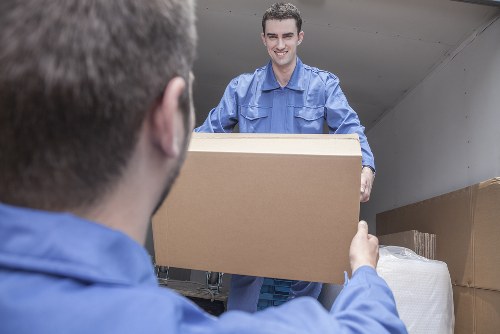 Local team collecting a sofa and other furniture from a Haringey property