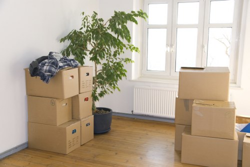 Trained movers handling furniture with care in Haringey