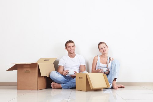 Packed moving boxes and furniture ready for transport