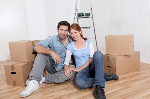 Business equipment and furniture prepared for transport in a Haringey office move
