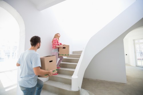 Careful piano transport through a residential property in Haringey
