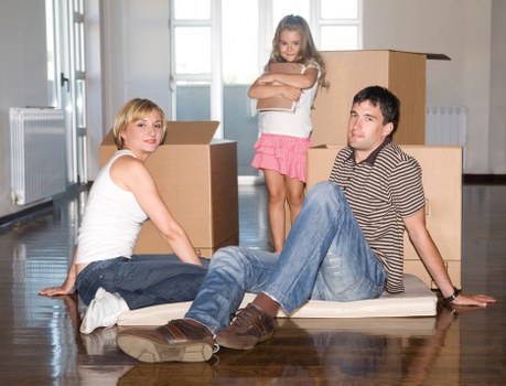 Loading household furniture into a removal truck in Haringey
